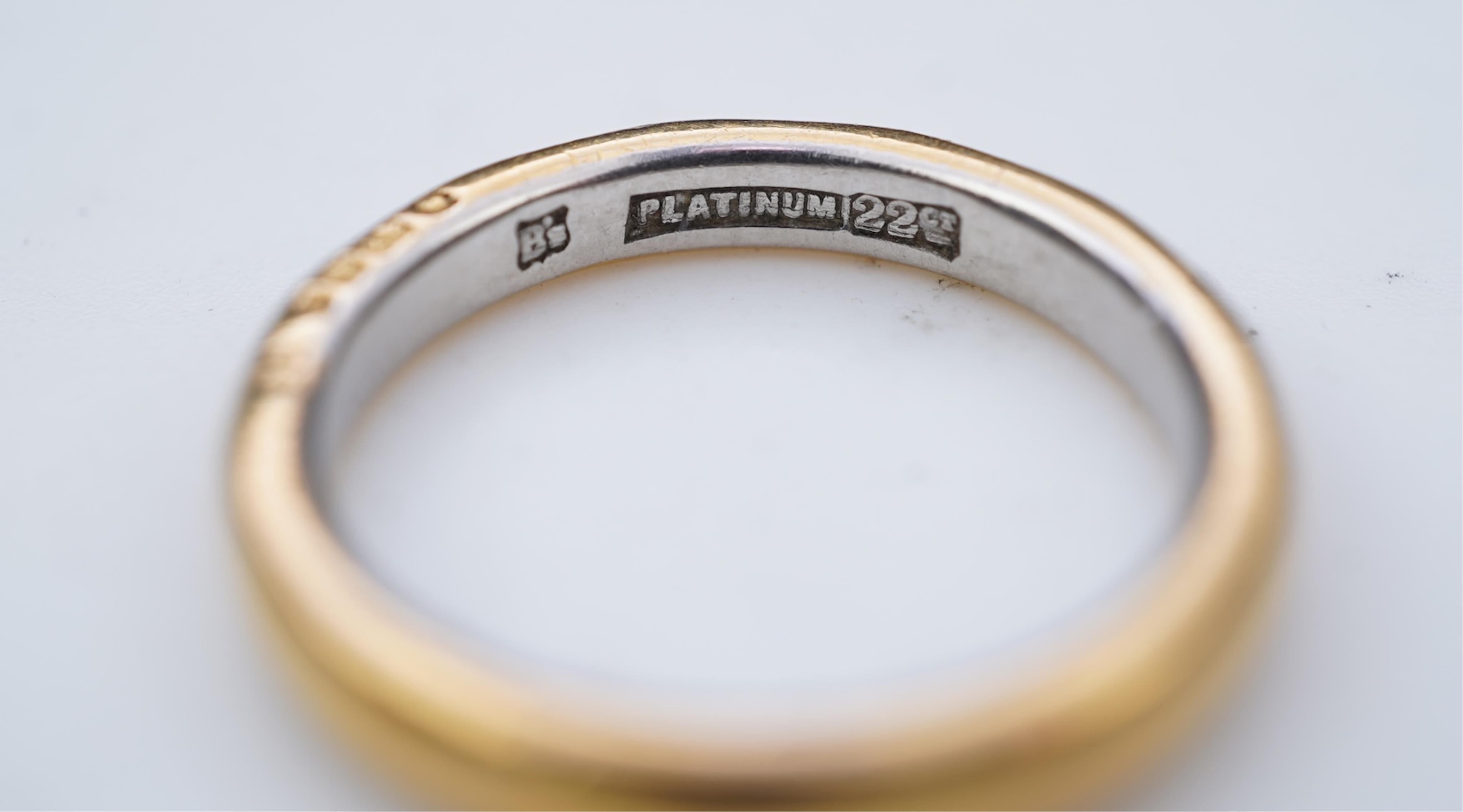 A collection of six gold wedding bands